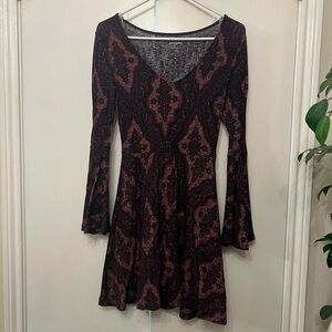 Gently used long sleeved dress size XS